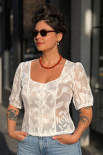 חולצות מכופתרות לנשים