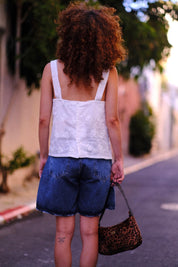 גופיית ‘Mila’ פרחונית לבנה שקפקפה